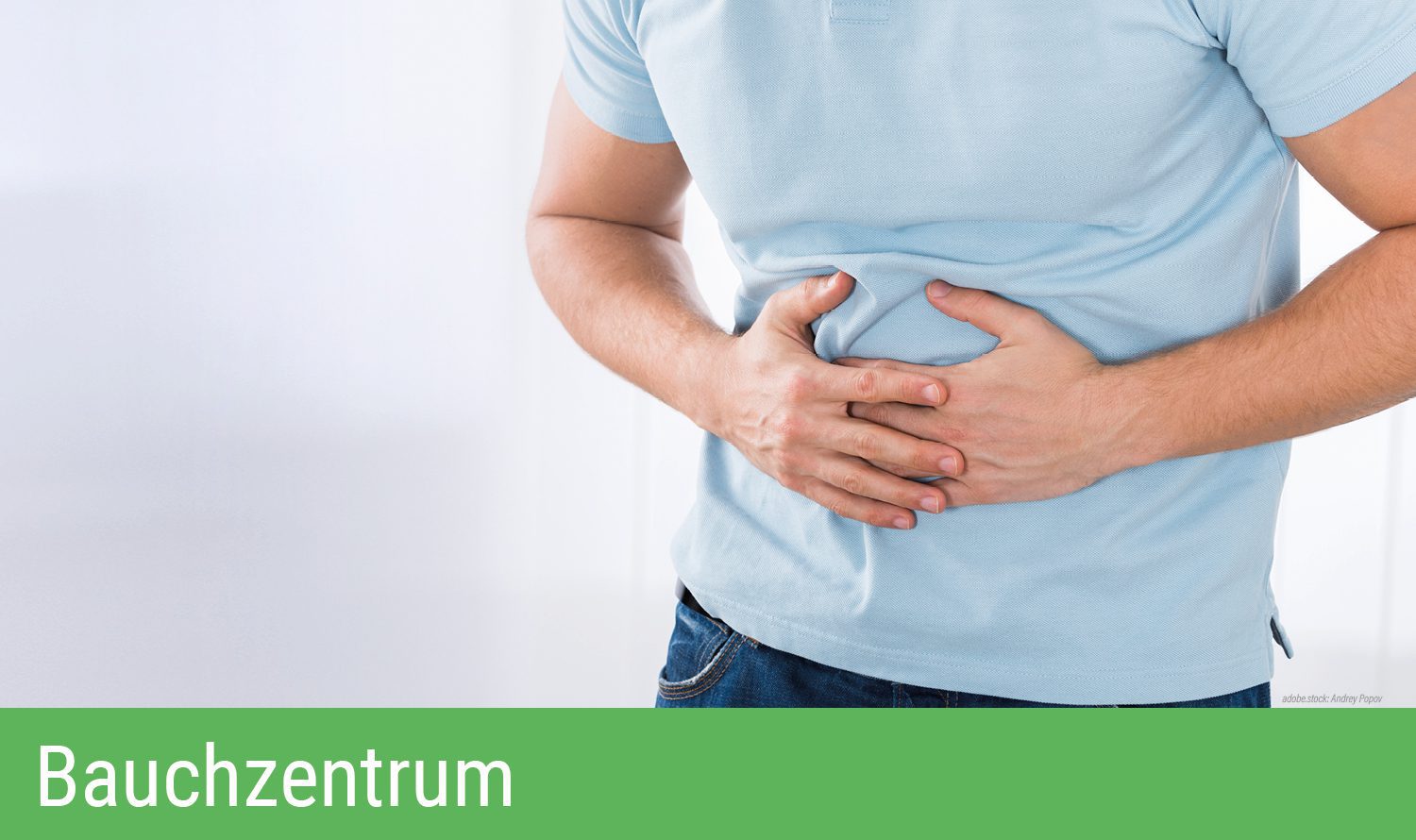 Im Ausschnitt gezeigte, männliche Person hält sich den schmerzenden Bauch. Grüner Balken am unteren Bildrand mit Aufschrift Bauchzentrum.